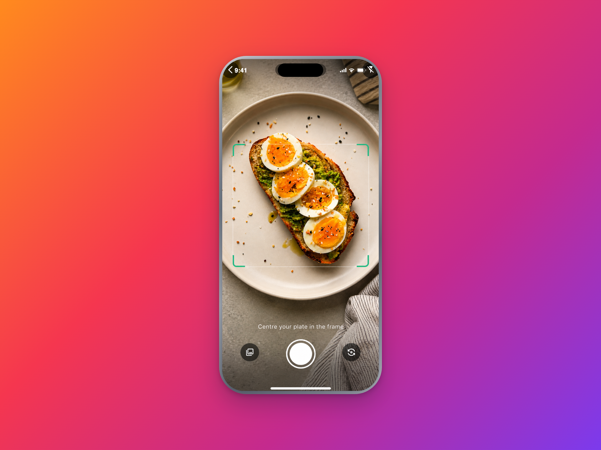 GlucoSpike camera viewfinder framing a plate of avocado toast with boiled eggs